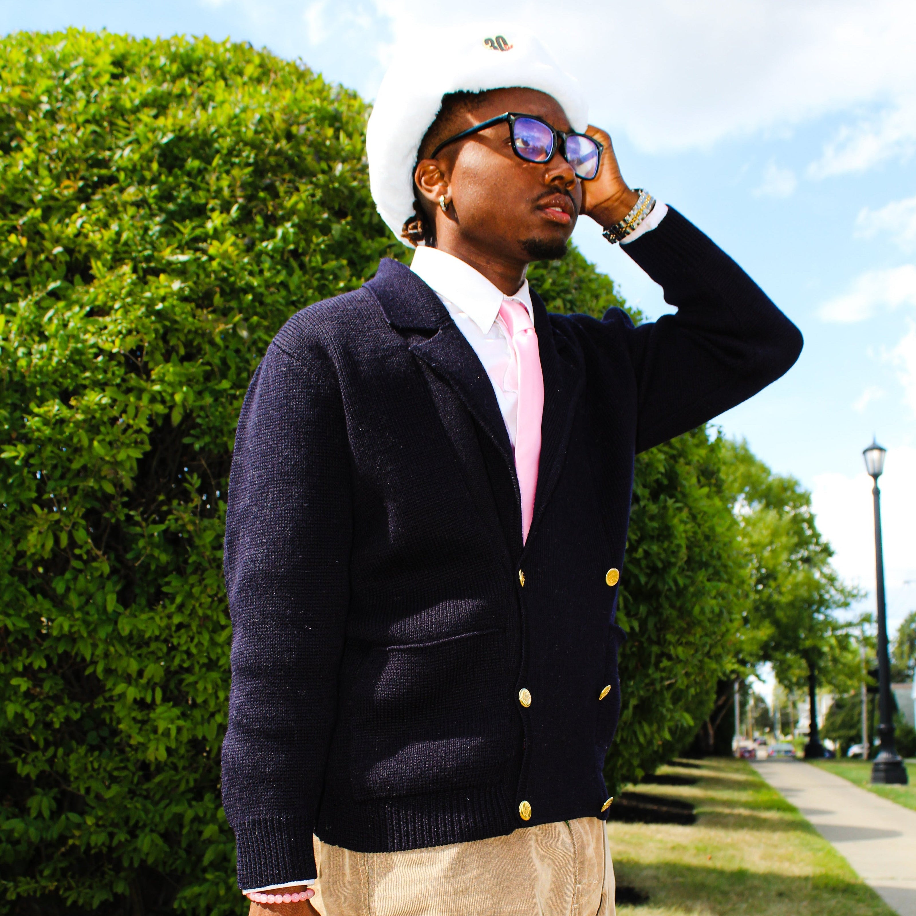 Black man wearing ushanka with SQRL glasses